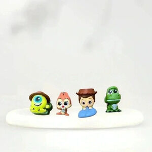Lot of 4 | Disney Doorables: Let’s Go Series – Woody, Dale, Mike Wazowski & Rex